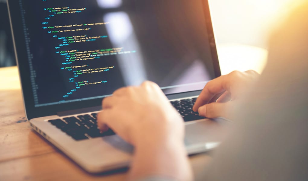 developer writing website design code