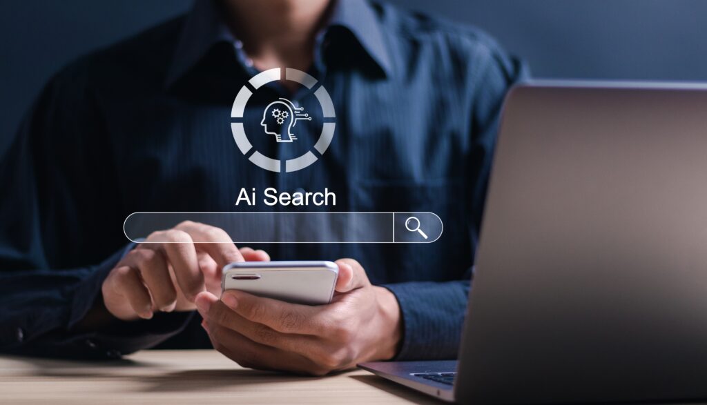 Person in business attire using ChatGPT AI interface on a laptop, representing artificial intelligence, machine learning, and automation in digital marketing strategy, with a focus on AI-powered tools for Google Ads and search campaigns.