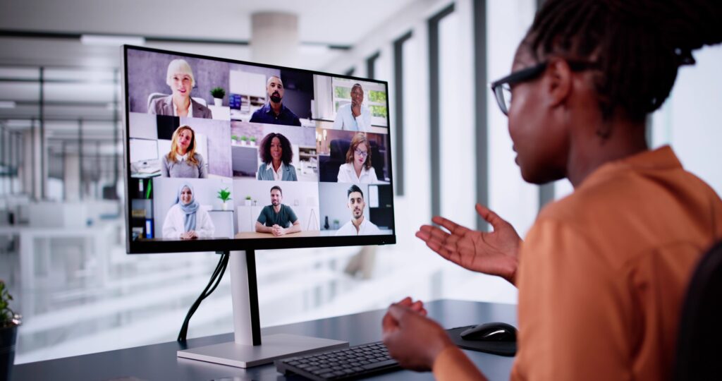 Independent financial advisors and consultants collaborating in a video seminar to enhance digital marketing, personal branding, and online identity.