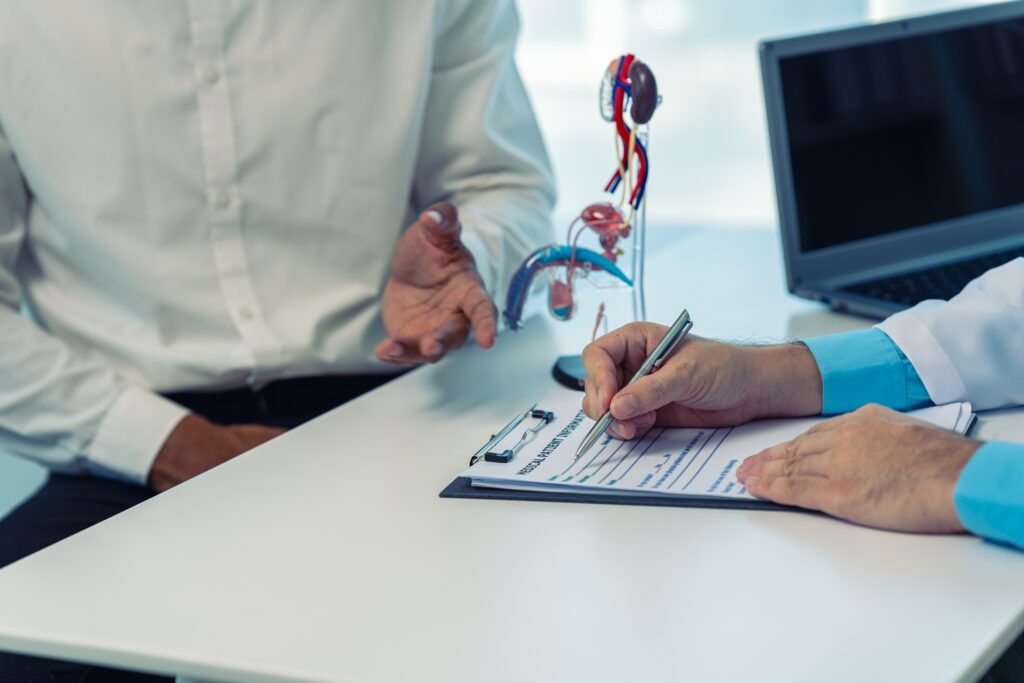 Urologist explaining treatment plan and gathering patient consent, highlighting HIPAA compliance, data security, and patient education in healthcare PPC and Google Ads strategies.