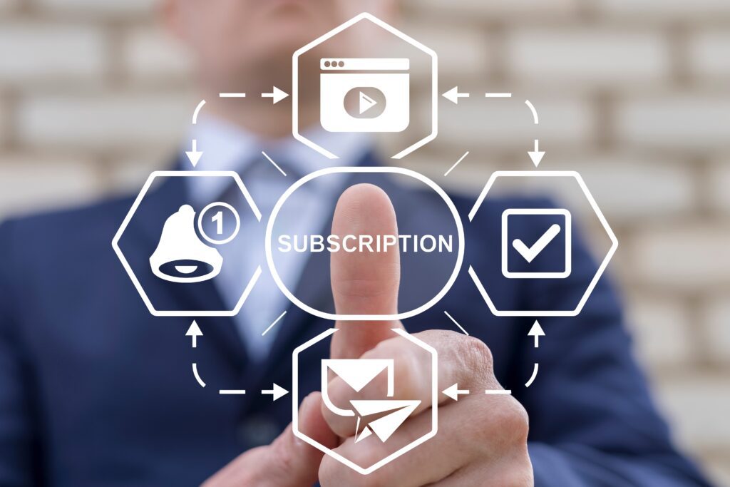 Business professional interacting with digital subscription interface, illustrating automation, customer journey mapping, churn management software, and predictive analytics in SaaS and ecommerce.