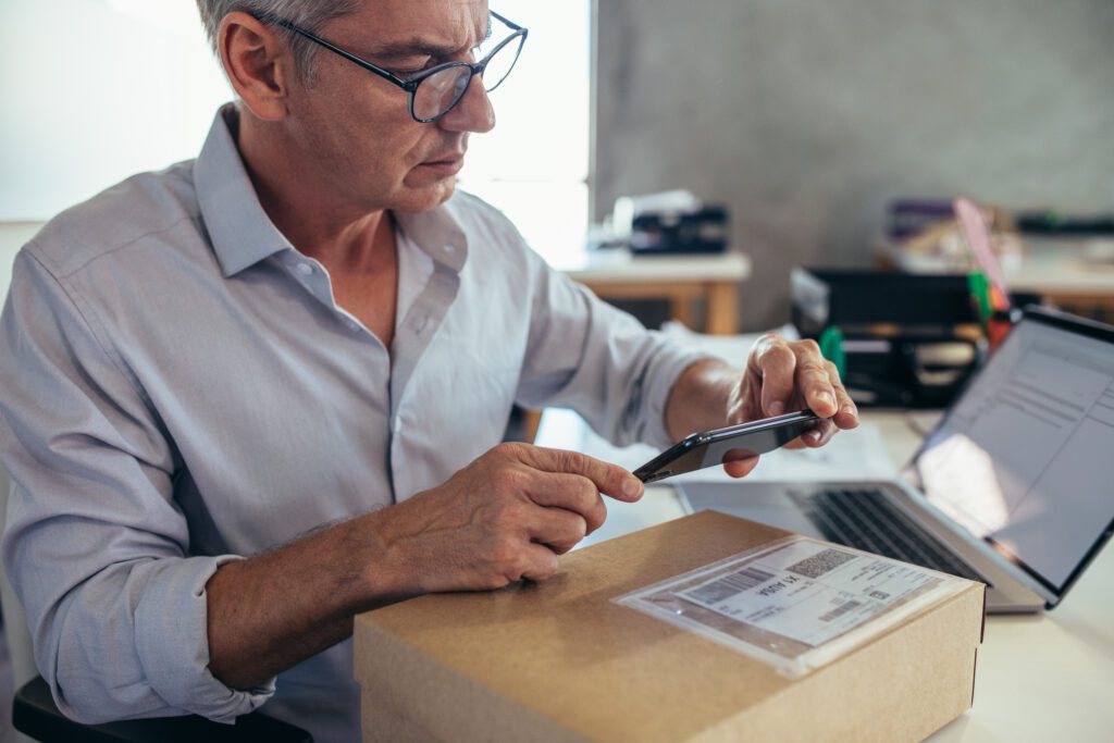 Ecommerce entrepreneur capturing product shipment data for an online store while optimizing landing page content, customer experience, and search engine ranking.
