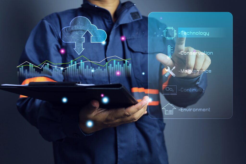 Home service technician in overalls interacting with a digital interface displaying icons for AI, delivery, robotics, data, and logistics, while holding a clipboard near stacked cardboard boxes—illustrating how broadband technology, mobile apps, smart software, and wireless connectivity enhance operations in plumbing, HVAC, pest control, and other home service industries.
