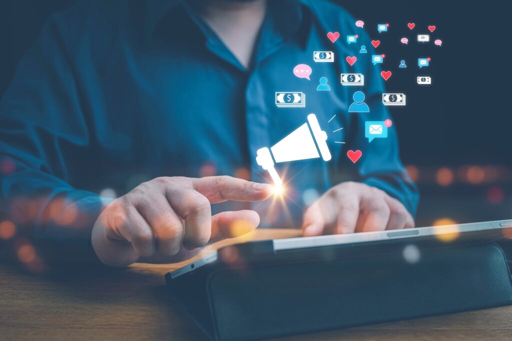 Home services marketing professional using a tablet with digital referral and social media marketing icons, representing automation, lead generation, and customer engagement.